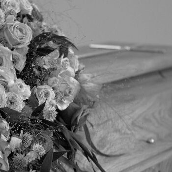 casket and flowers casket and flowers in grey