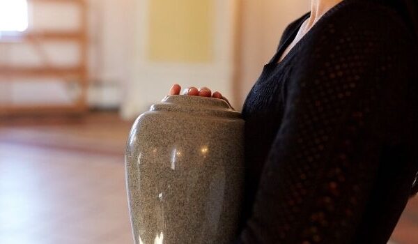 woman holding urn