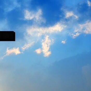 cremation and religion cross and blue sky